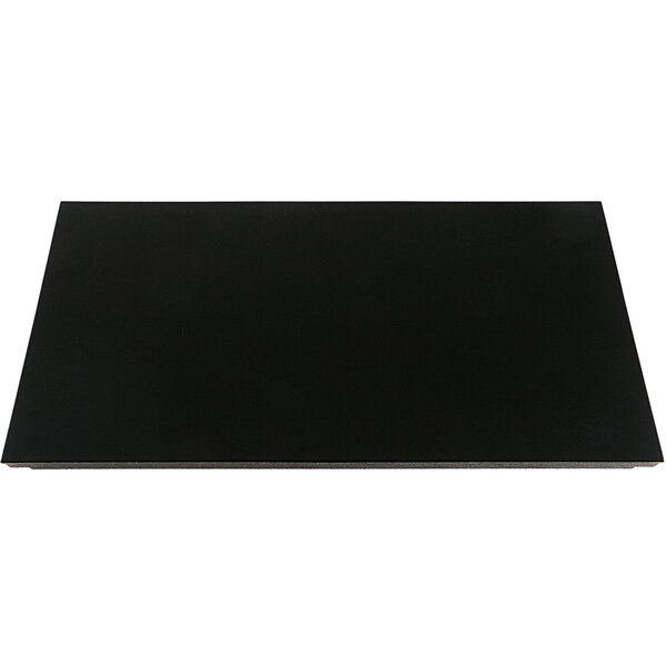 A black rectangular Lang hot plate on a white counter.