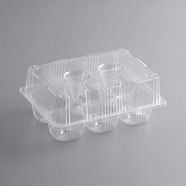 A clear plastic Choice container for 6 cupcakes with a clear dome lid.