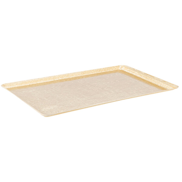 A white rectangular tray with a gold border.