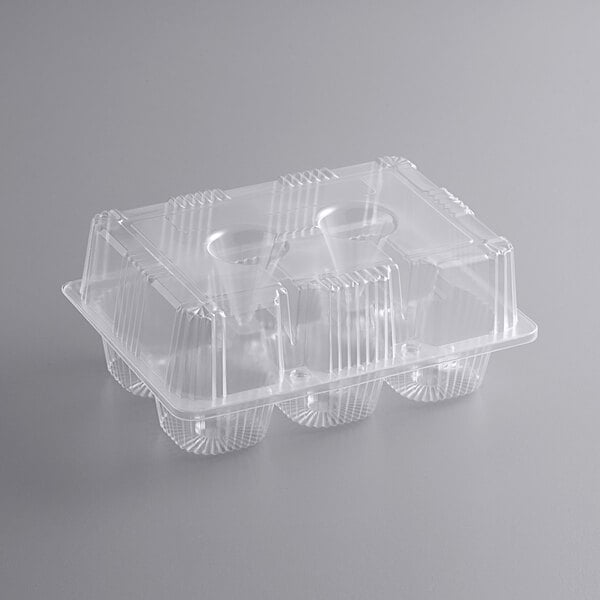 A Choice clear plastic container with a clear lid containing six cupcakes.