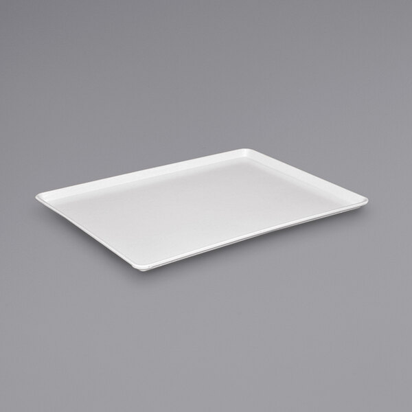 A white rectangular tray on a gray surface.