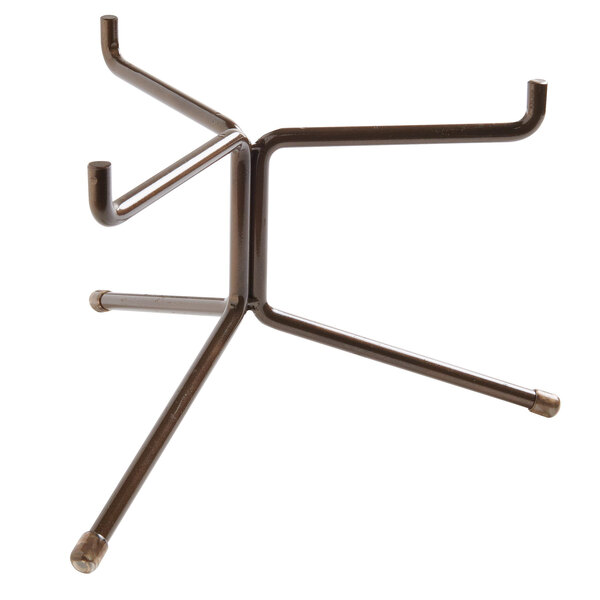 A bronze metal Cal-Mil plate stand with three legs.