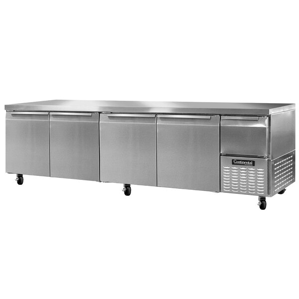A Continental Refrigerator stainless steel worktop refrigerator with three doors.
