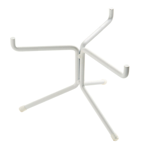 A white metal Cal-Mil plate stand with two legs.