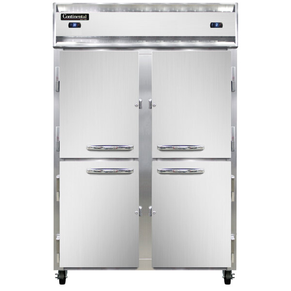A large white Continental Refrigerator with two doors and silver handles.