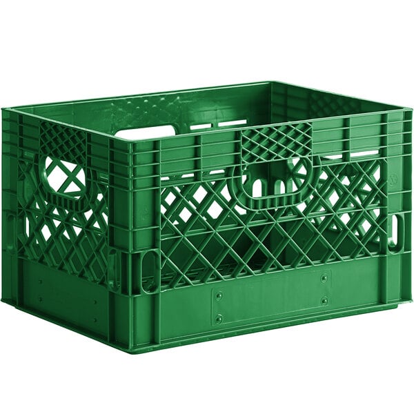 A green plastic rectangular milk crate with handles.