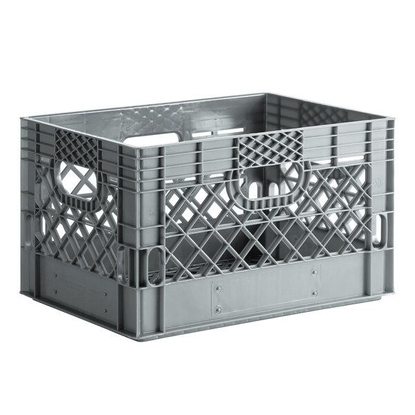 A grey plastic rectangular milk crate with handles.