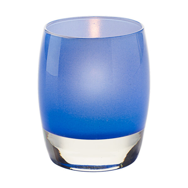 A blue glass Hollowick Contour Royal Aura Votive candle holder.