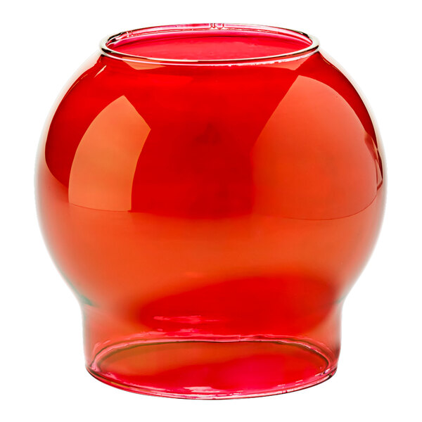 A red glass bowl with a small hole in the bottom.
