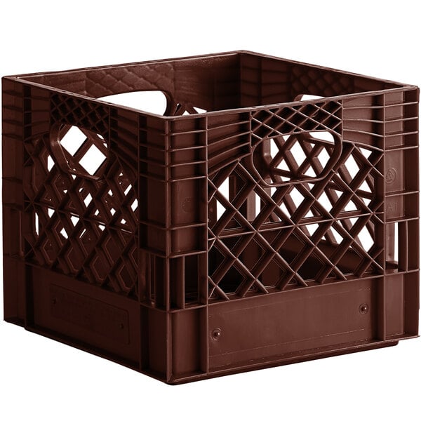 A brown plastic milk crate with holes and a handle.
