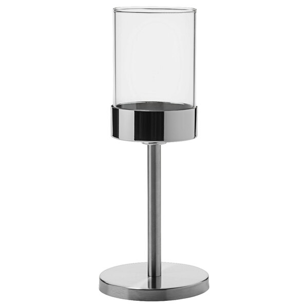 A brushed stainless steel Hollowick candlestick base with a clear glass cylinder shade.