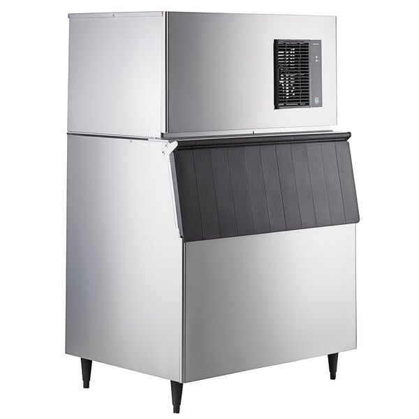 A large silver Hoshizaki air cooled ice machine with a black vent and stainless steel door.