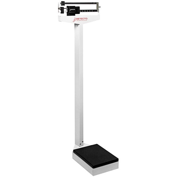 A white Cardinal Detecto eye-level mechanical beam scale on a stand.
