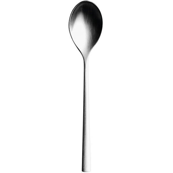 A silver Sola stainless steel teaspoon with a white handle.