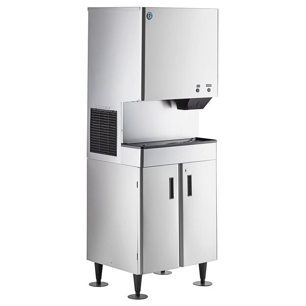 A stainless steel Hoshizaki ice machine and water dispenser with two doors.
