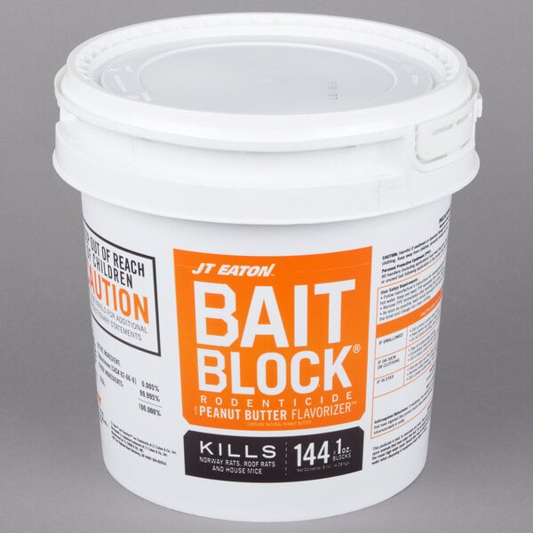 A white pail of JT Eaton Peanut Butter Bait Blocks with orange and black text.
