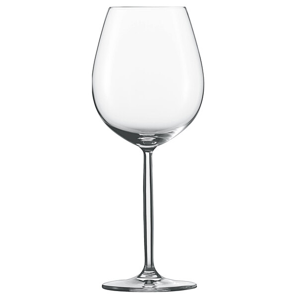 A close-up of a clear Schott Zwiesel wine glass with a long stem.