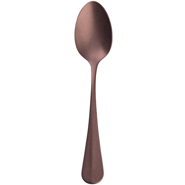 An Arc Cardinal stainless steel teaspoon with a copper handle.
