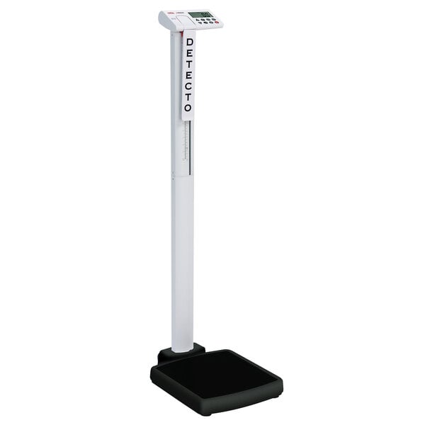 A white Cardinal Detecto digital scale with a black base.