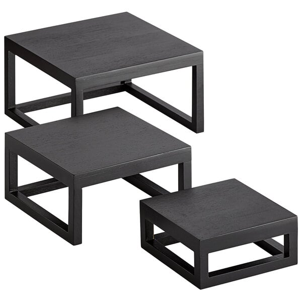 A black square American Metalcraft riser set on a table.