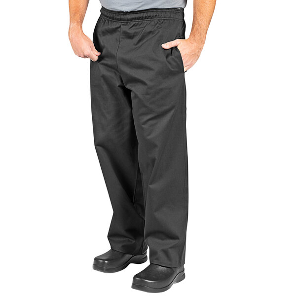 A man wearing Uncommon Chef black pants.