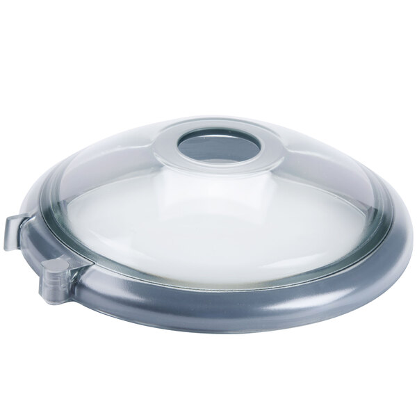 A clear plastic Robot Coupe lid with a circular seal over a hole.