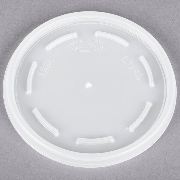 A white plastic Dart lid with a round vent.