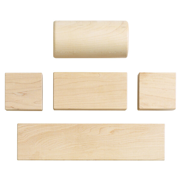 A group of Jonti-Craft hardwood blocks with different sizes and shapes on a wood surface.