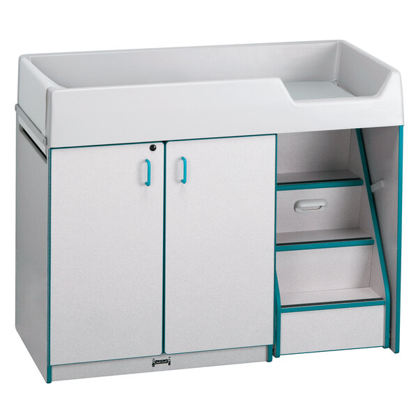 A white rectangular diaper changing station with teal and gray accents.