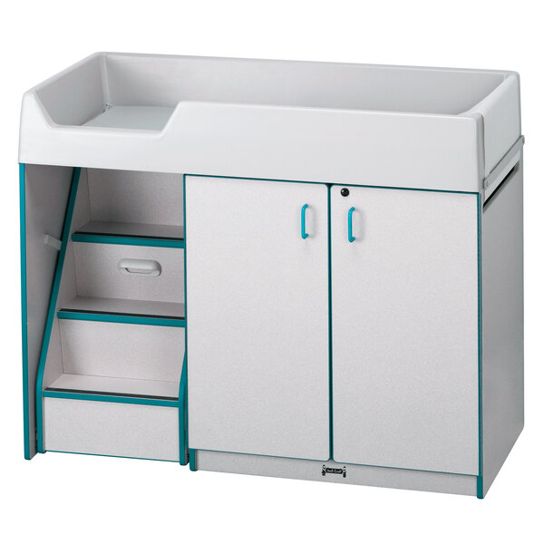A white rectangular Rainbow Accents diaper changing station with teal accents and gray details.