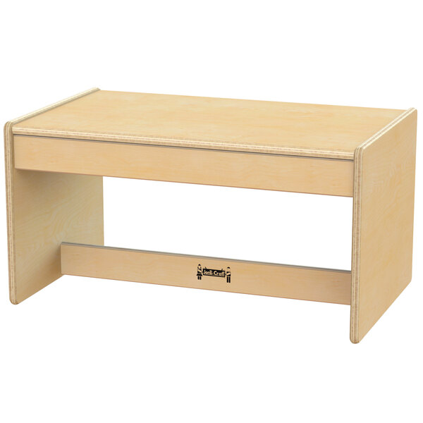 A Jonti-Craft children's wood coffee table with a shelf.