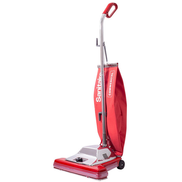 A red Sanitaire TRADITION Wide Track vacuum cleaner with a red cover and bag.