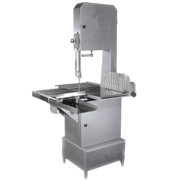An Omcan floor model vertical band saw with a piece of metal on it.