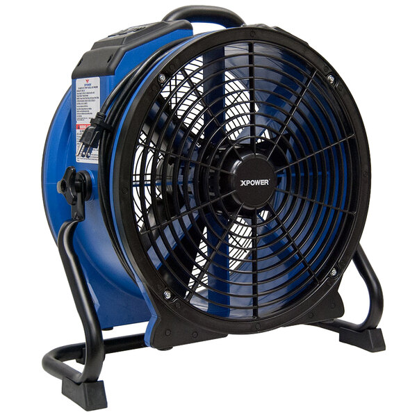 An XPOWER blue and black industrial axial fan on a stand.