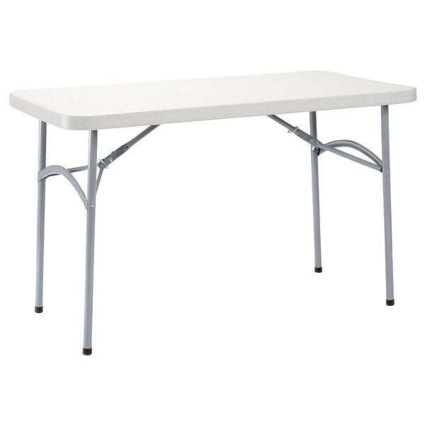 A white rectangular National Public Seating plastic folding table with metal legs.