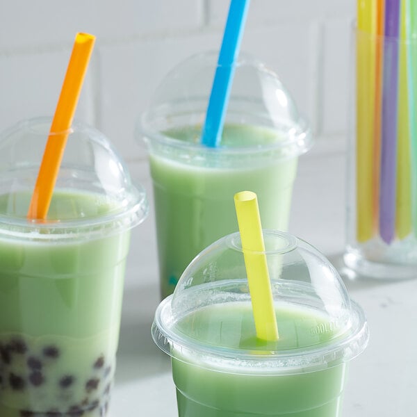 A group of green drinks with Choice neon yellow straws.