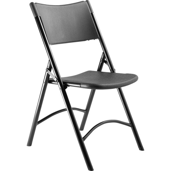 A National Public Seating black metal folding chair with black plastic back and seat.