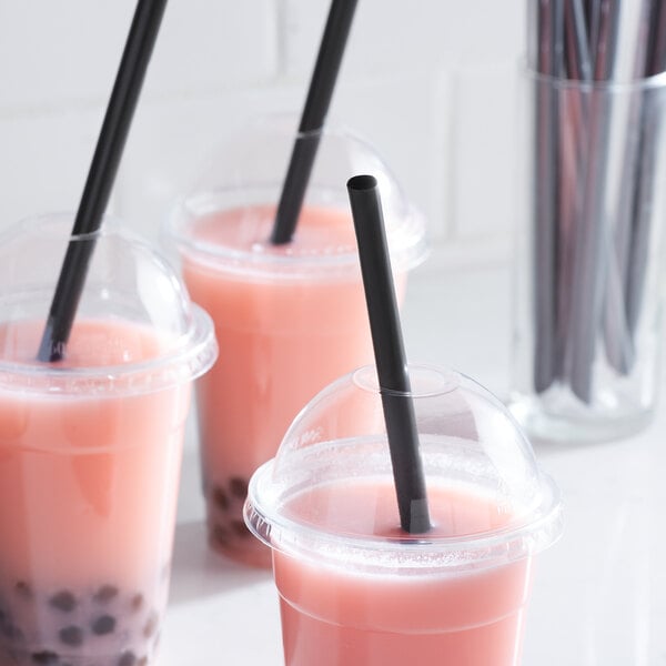 Three pink drinks with Choice black pointed straws.