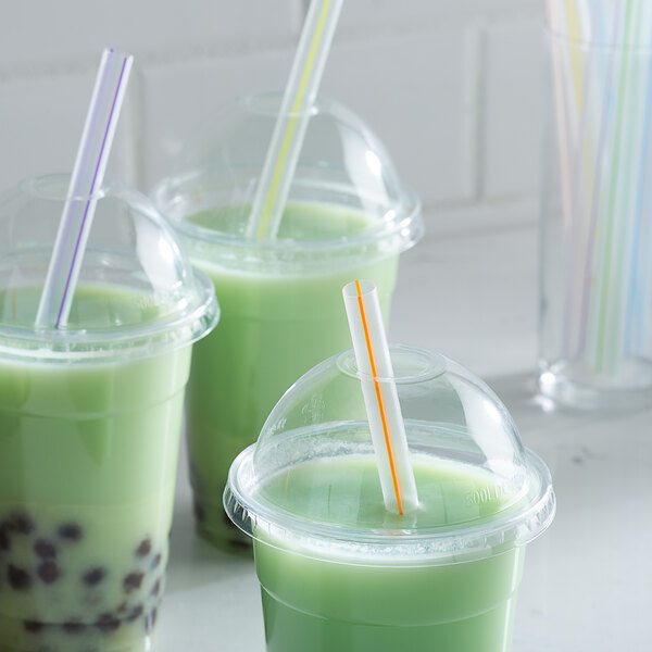 Three green drinks with Choice multicolor striped straws.