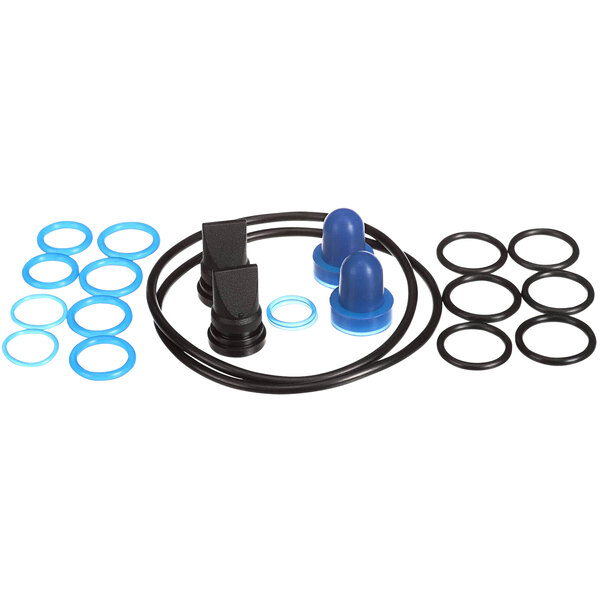 A group of blue and black gaskets and rubber seals with round blue objects in the background.