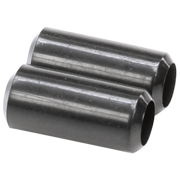 Two black cylindrical rubber bushings.