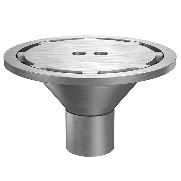 A Zurn stainless steel floor drain with a heavy-duty perimeter grate over a hole.