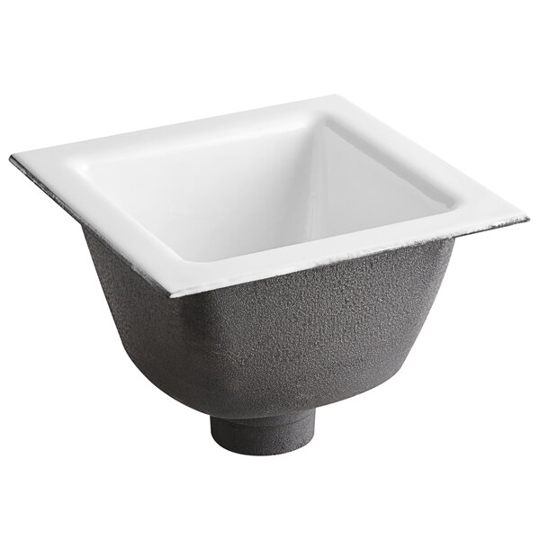 A black and white square Zurn floor sink.