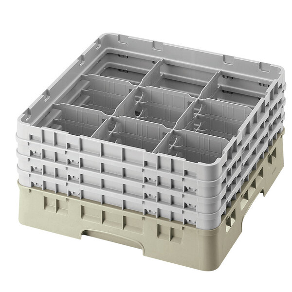 A beige plastic Cambro glass rack with 9 compartments and an extender.
