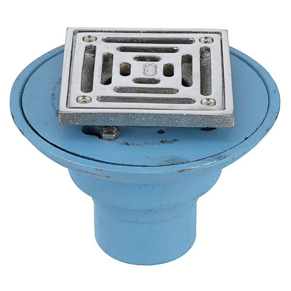A blue Zurn cast iron shower drain with a square metal grate.