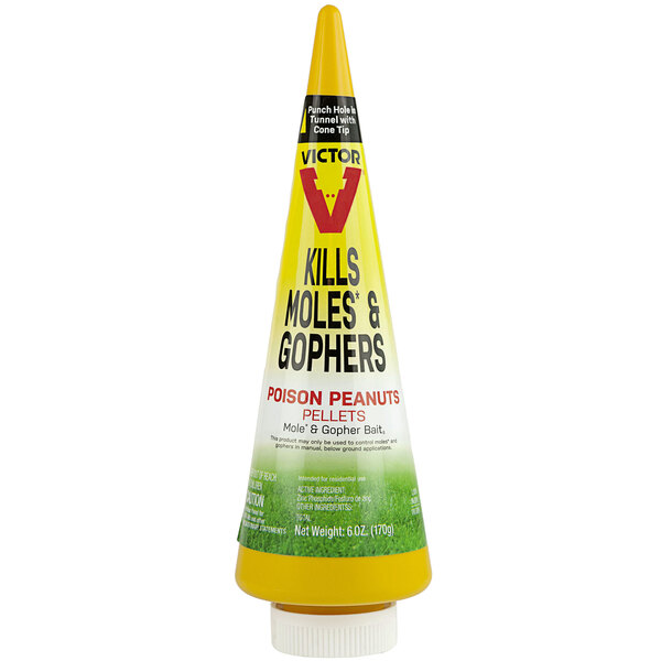 A yellow Victor Pest bottle of mole and gopher poison.