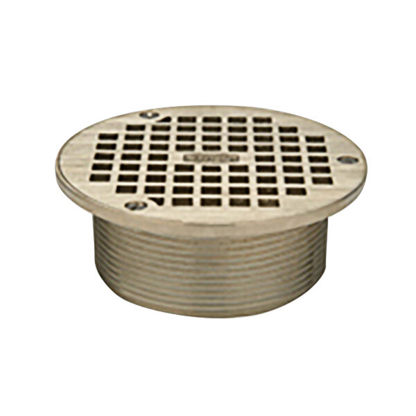 A Zurn polished bronze round metal drain grate with a metal mesh.