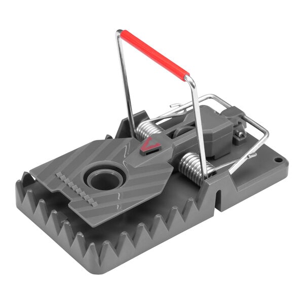 A Victor Pest metal rat trap with a red handle.