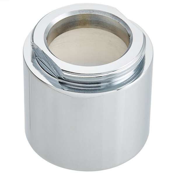 A chrome plated metal Zurn escutcheon nut with a hole in a silver cylinder.