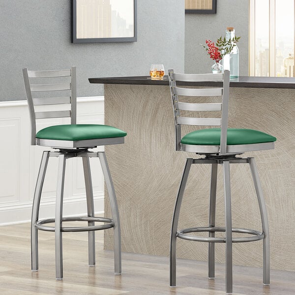 Lancaster Table & Seating Clear Coat Finish Ladder Back Swivel Bar Stool with 2 1/2" Green Vinyl Padded Seat